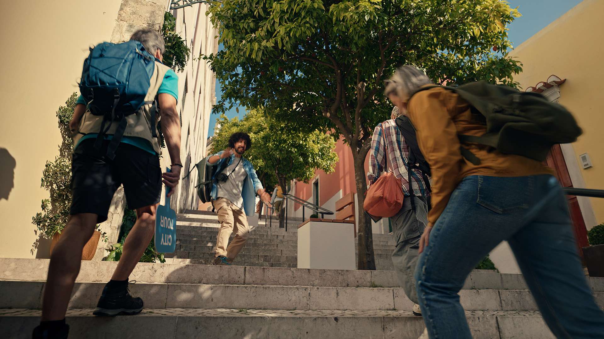 man waling down stairs